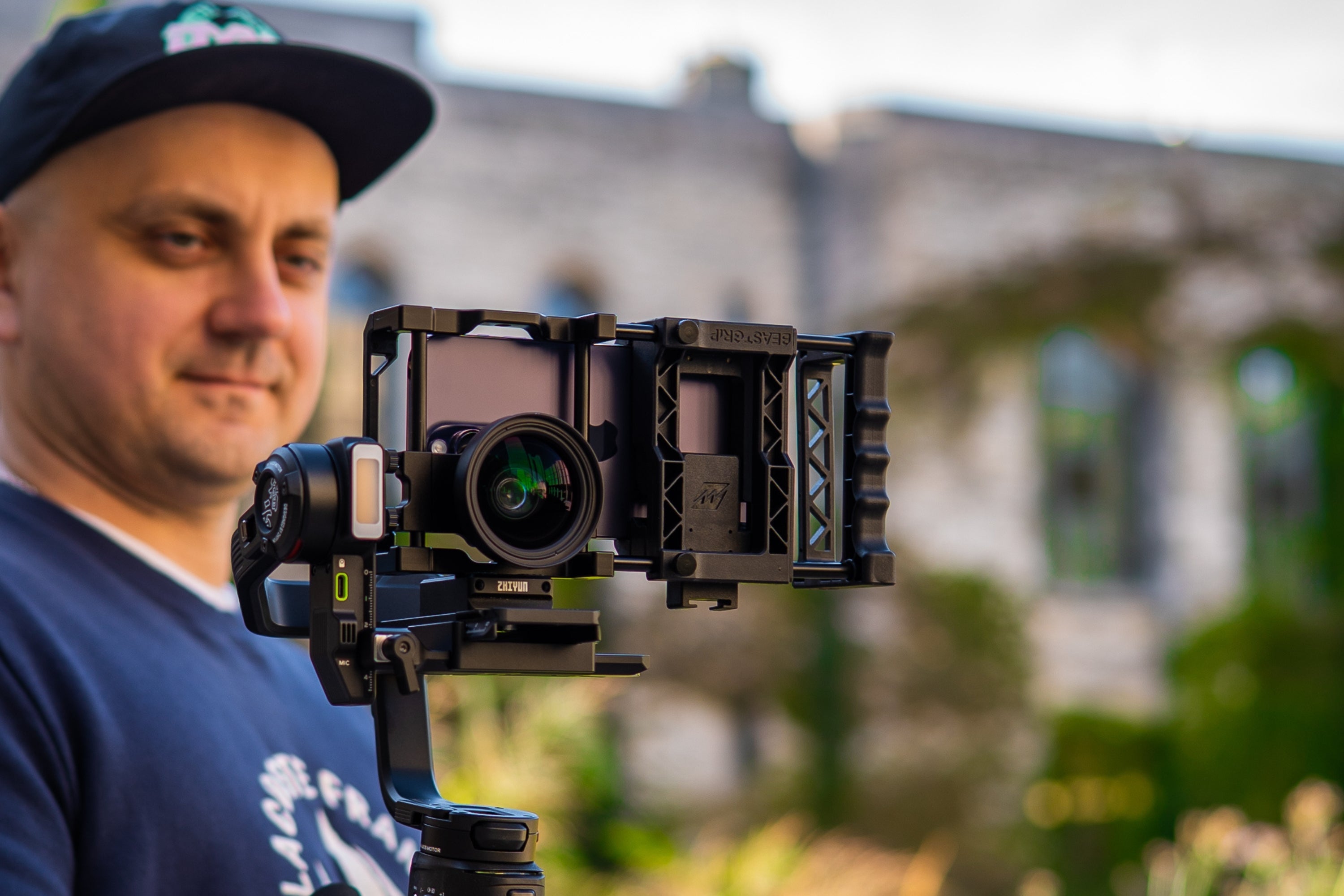 iPhone 14 with Beastgrip Pro Universal camera rig mounted on gimbal. 0.75X Wide angle lens attached