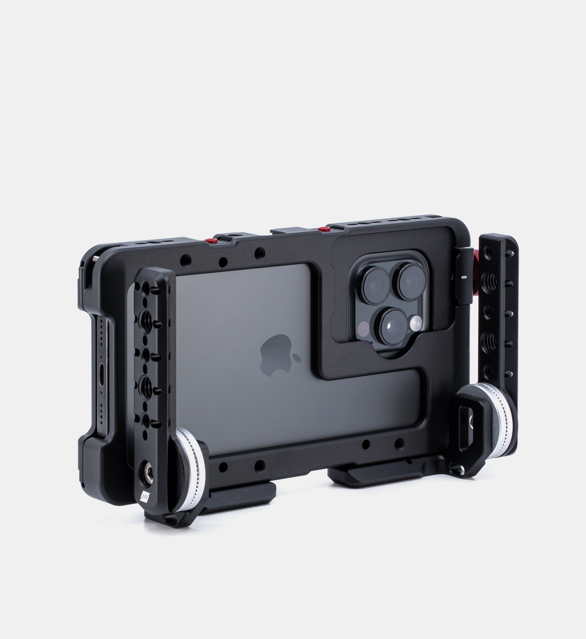 Studio shot of Beastgrip RT and LT Mounts attached to bottom of Beastcage for iPhone 16 Pro or 16 Pro Max, facing forward — showcasing front-facing dual mount configuration for flexible rig customization.