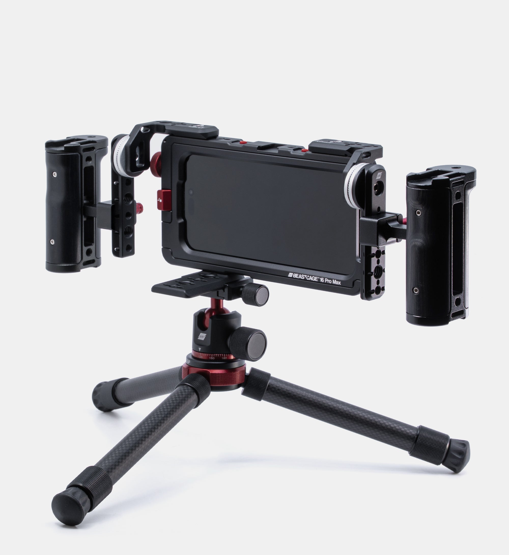 Beastgrip RT and LT Mounts attached to top of Beastcage for iPhone 16 Pro or 16 Pro Max, facing rear with two Beastgrip side handles mounted via NATO rails — full rig secured to Beastgrip BT-60 mini tripod using Beastgrip Quick Release Plate for professional mobile video production.