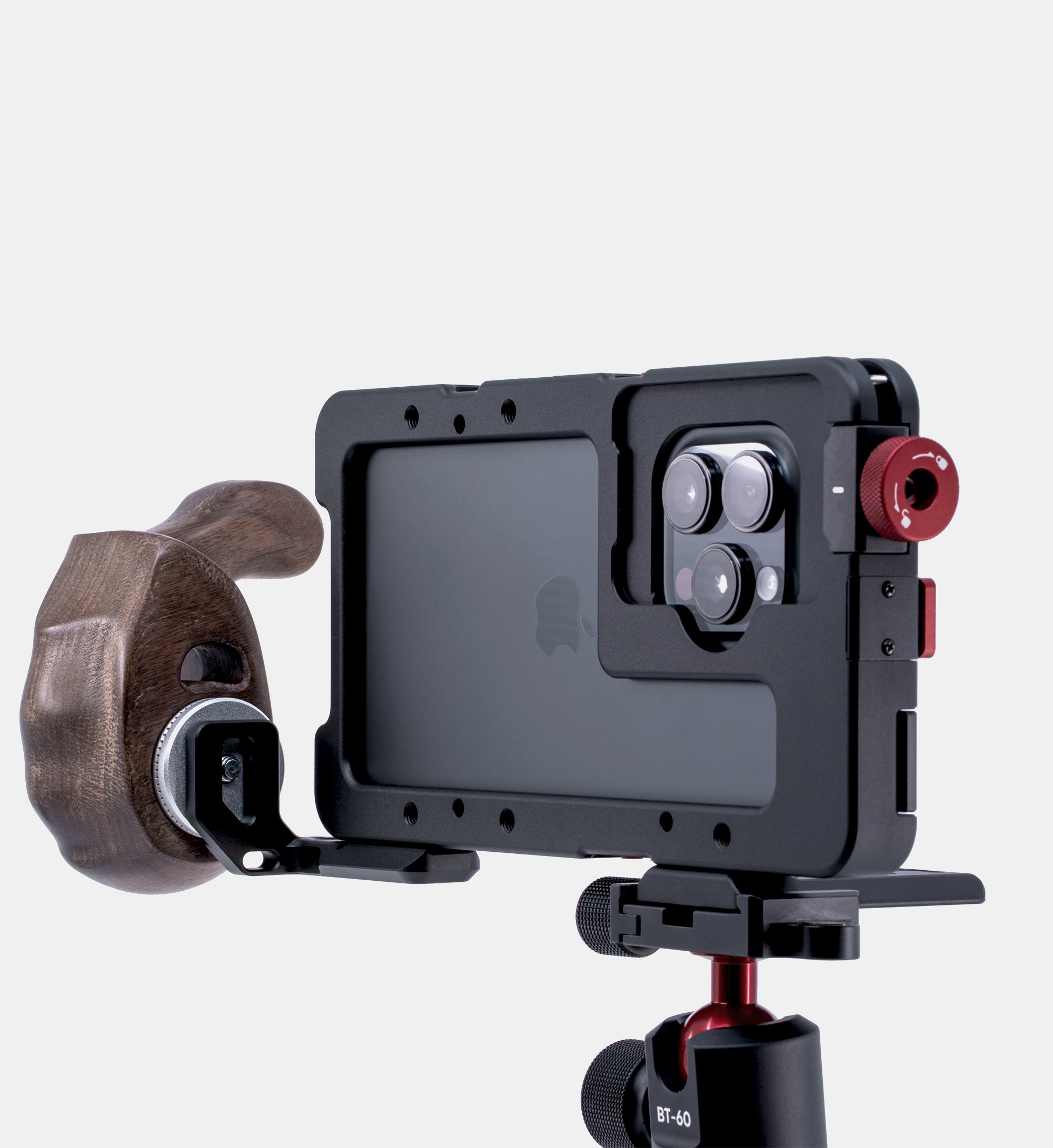 Beastgrip RT Mount with side handle attached via ARRI rosette on Beastcage for iPhone 16 Pro or 16 Pro Max, mounted on tripod using Beastgrip Quick Release Plate — stable and customizable iPhone rig setup for handheld and tripod use.
