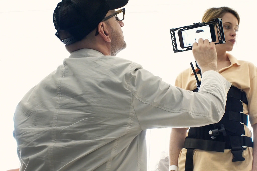 Unsane iPhone rig with Beastgrip Pro taken from behind the scenes video, Claire Foy and Steven Soderbergh are shown