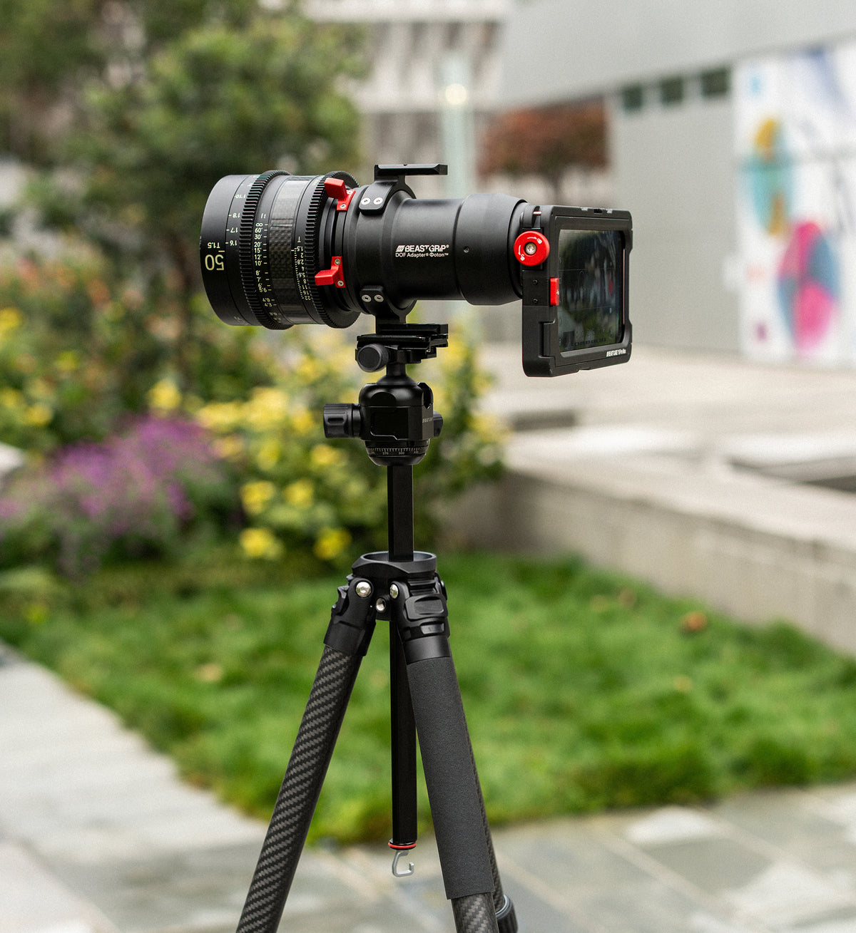 Beastgrip BT-200 carbon fiber tripod supporting a Beastcage smartphone filmmaking rig with DOF Adapter Foton Фoton and cinema lens.