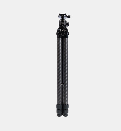 Front-view studio product shot of the Beastgrip BT-200 carbon fiber tripod fully folded into its compact position for easy storage and transportation.