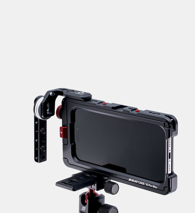 Beastgrip LT Mount fully assembled and attached to the left side of Beastcage 16 Pro Max — clean side view showing complete mount with NATO rail for iPhone video rig setups.
